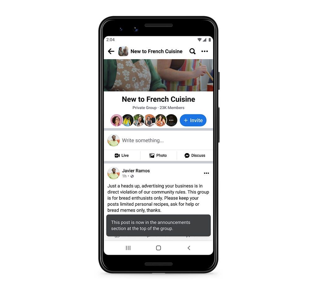 A cell phone with a facebook page open on it.