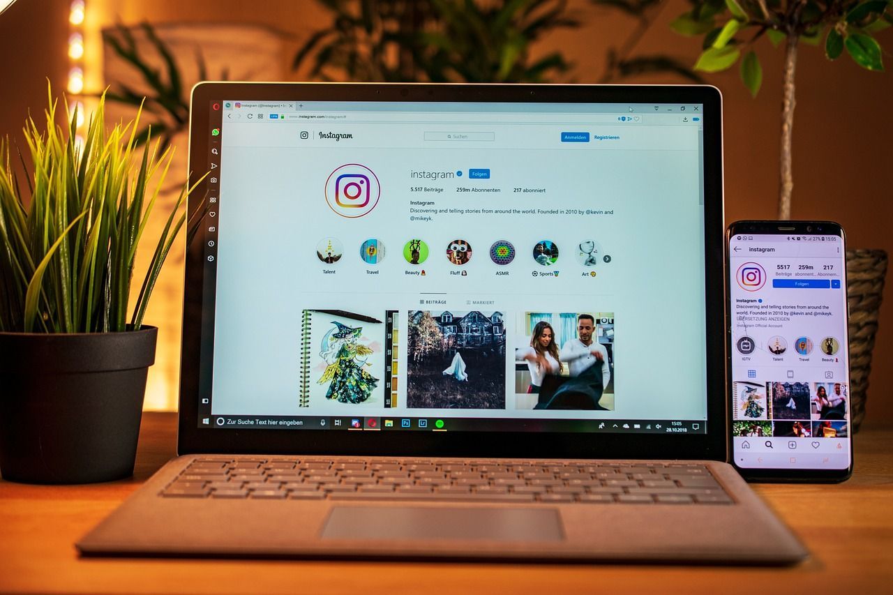 Laptop opened with instagram launched as a funnel for user-generated content to help brands grow