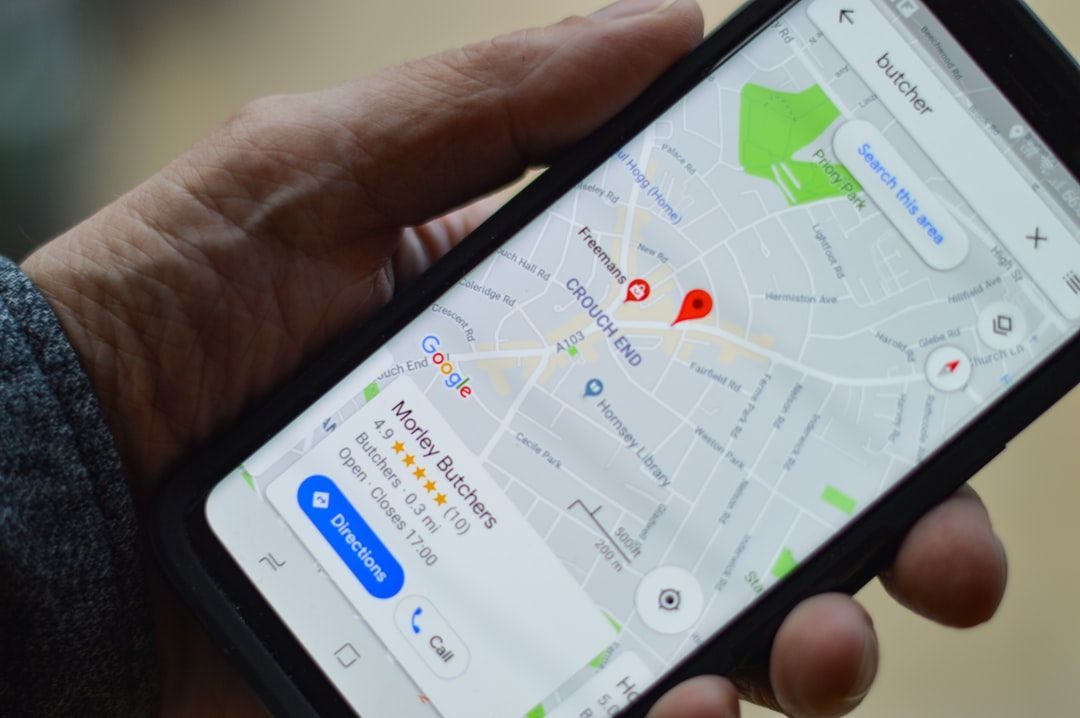 Local listing management with a business profile and location shown on a smartphone map.