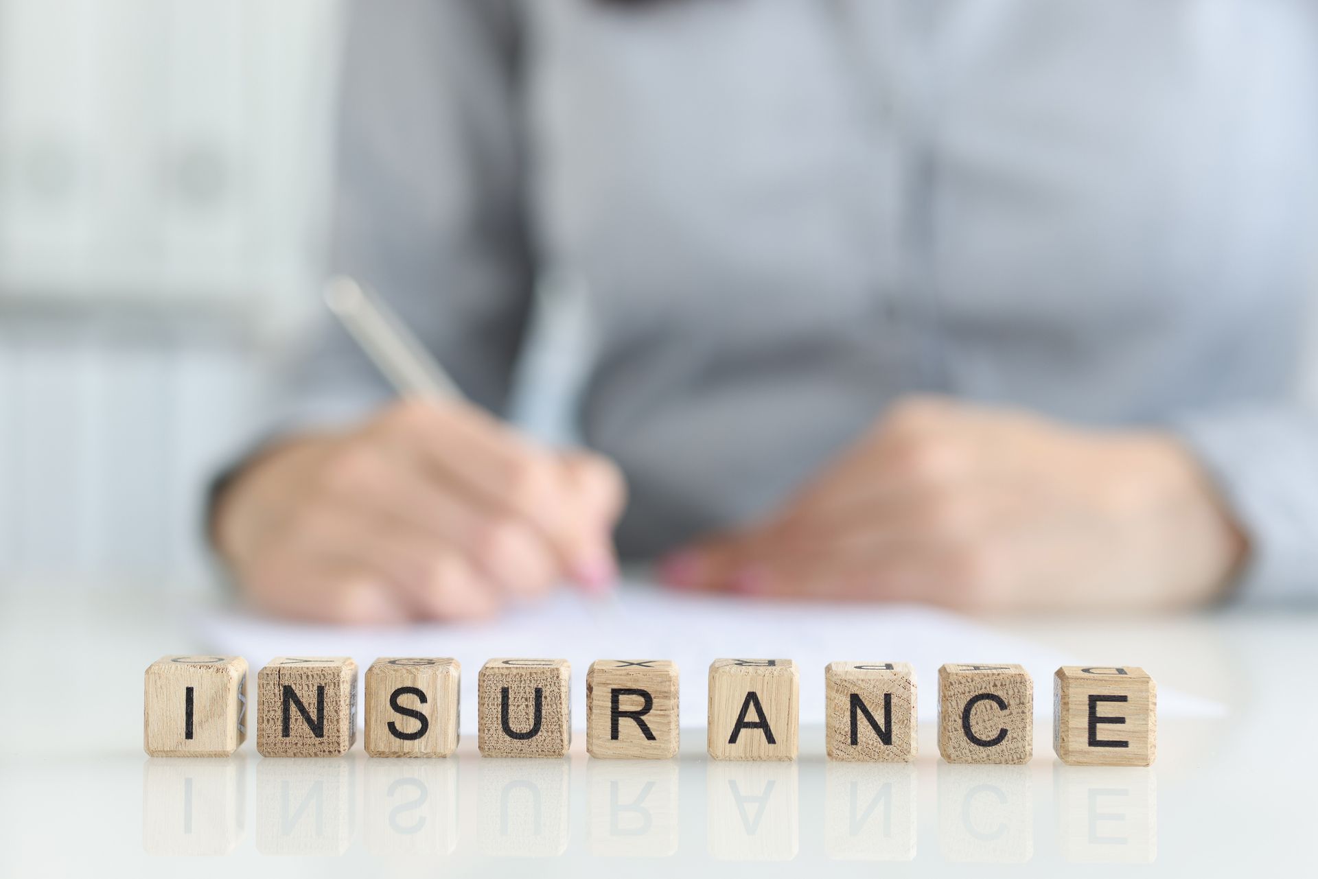 Personalized service at insurance agency in Central showing professional consultation.