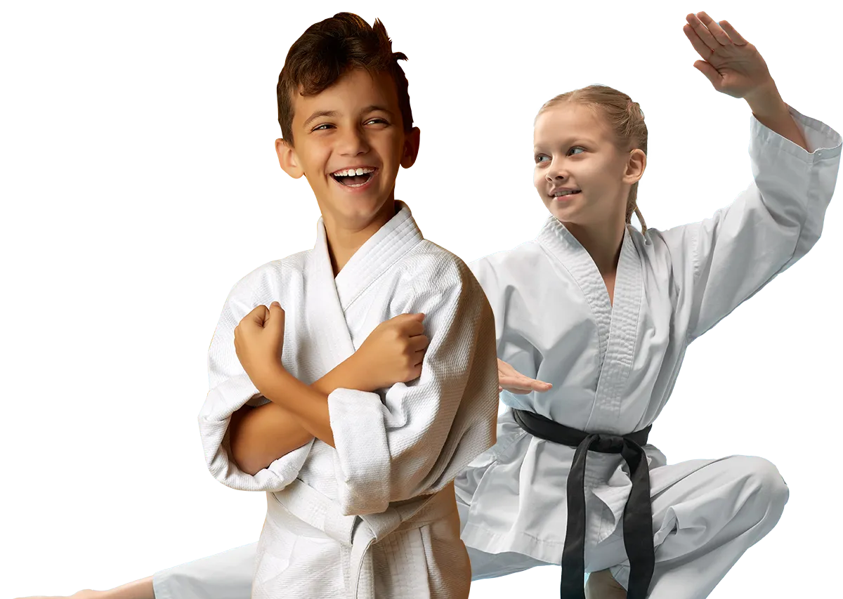 A boy and two girls are wearing karate uniforms and pointing at the camera
