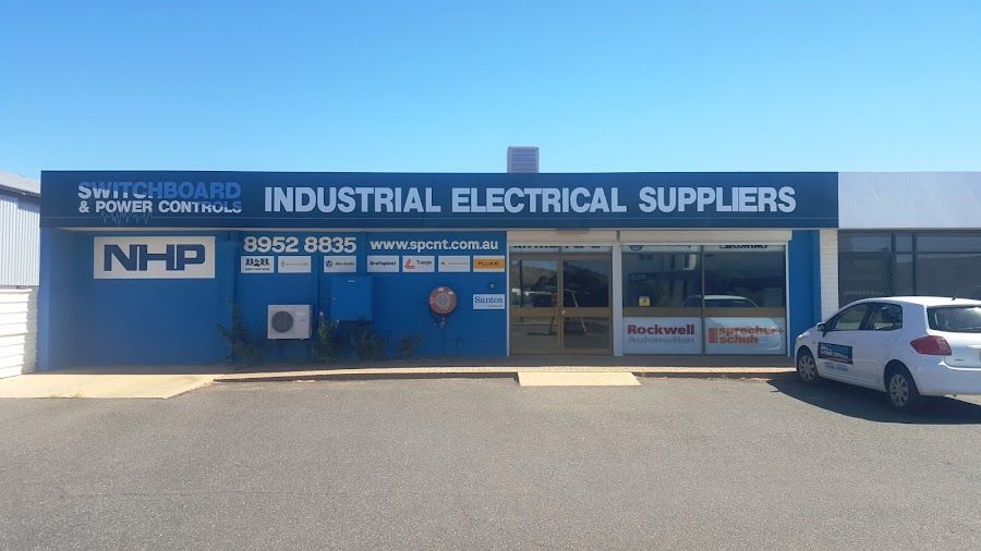 Front of a Building That Says Industrial Electrical Suppliers — Switchboard & Power Controls Pty Ltd in Alice Springs, NT