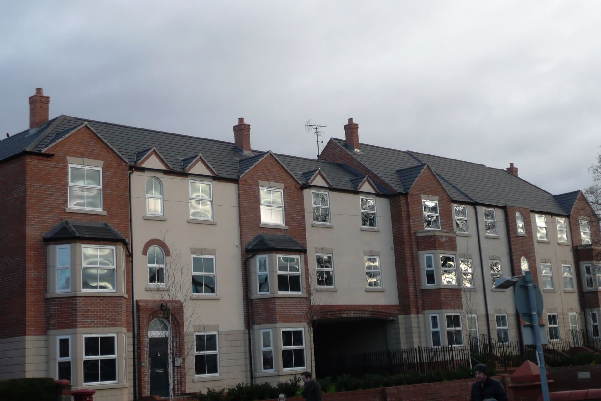 A new development of flats with a grey roof