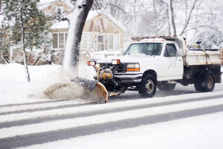 Truck Plowing Snow On The Road — Ogden, PA — County Tree Service