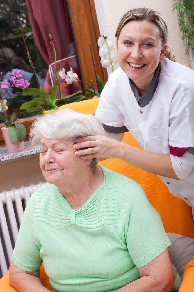 Woman Receiving Foot Massage — VR Mobile Beauty Therapy In Oxenford QLD