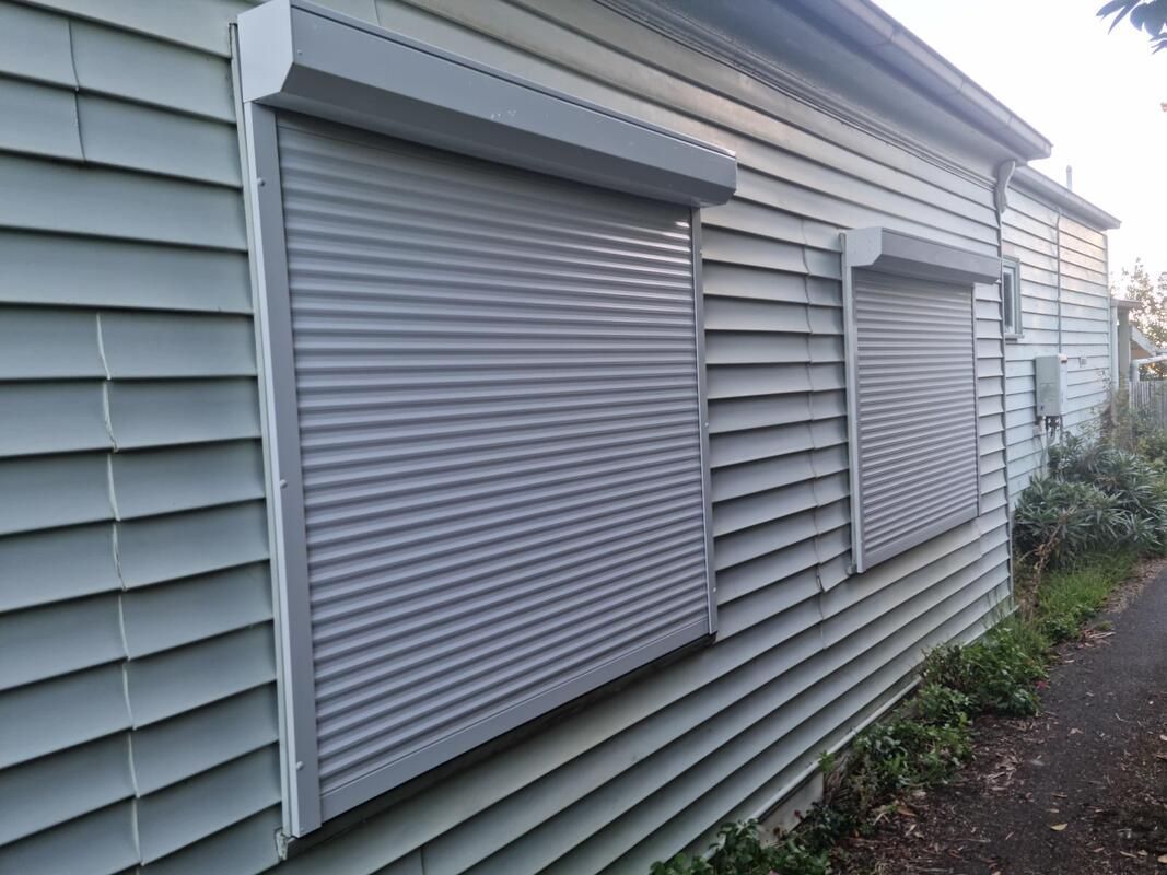 A Gallery of Elegant White Roller Shutters in a Luxaflex Display - Luxaflex Outdoor Blinds & Awnings In Ballarat