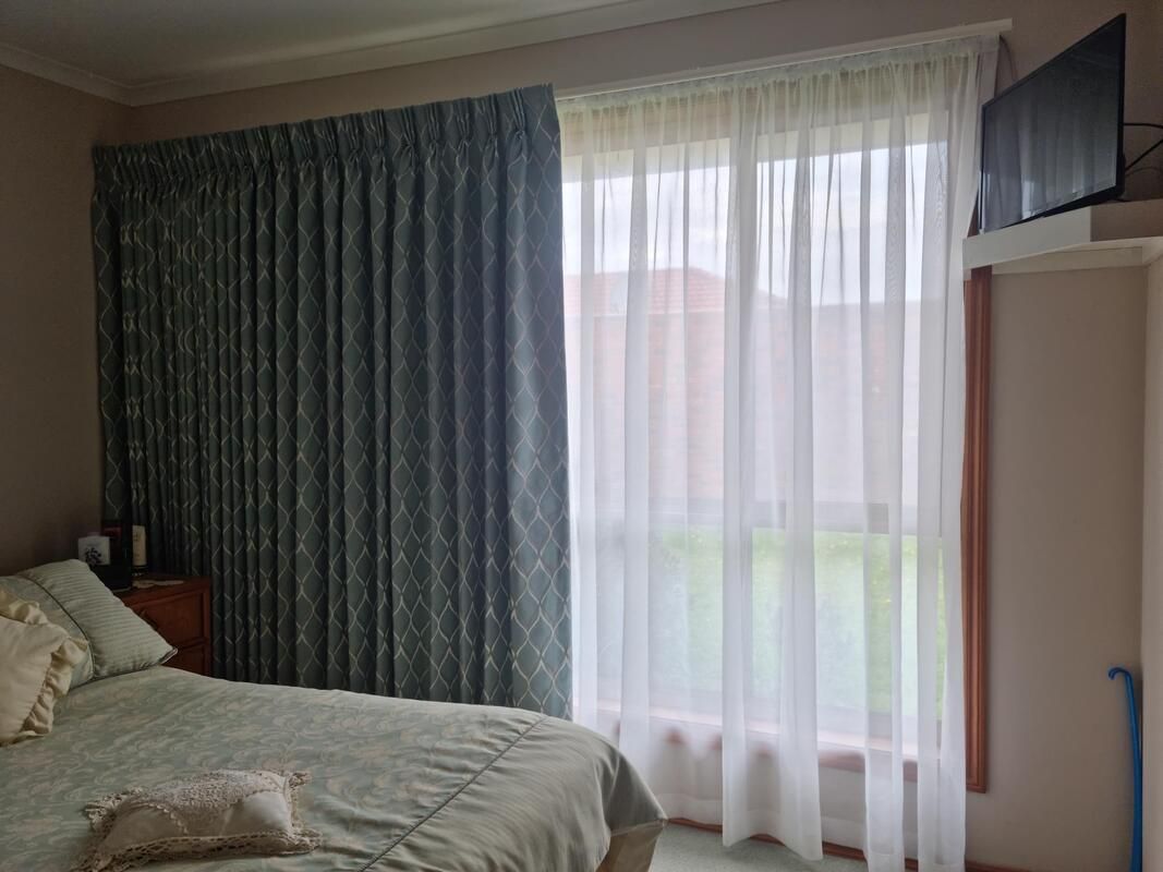 Bedroom with Sheer Curtains Creating an Elegant and Airy Ambiance - Luxaflex Window Furnishings In Daylesford