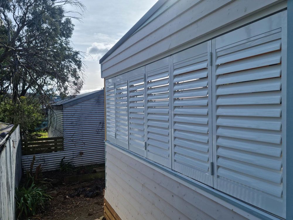 White Exterior Shutters Complementing Eureka Home's Charm - Luxaflex Outdoor Blinds & Awnings In Ballarat