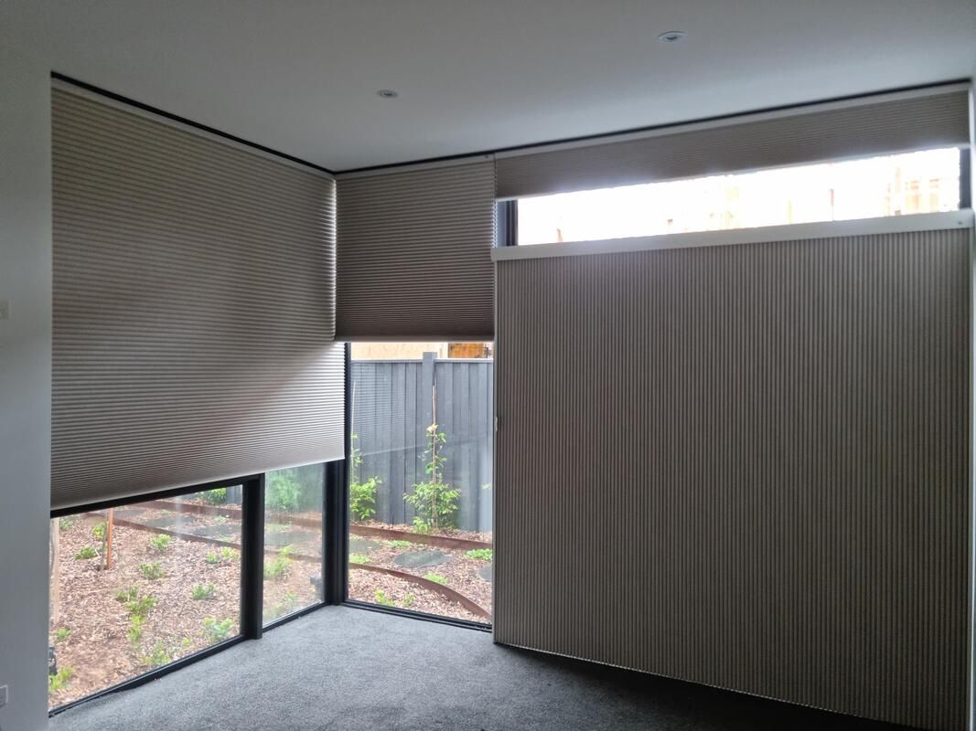 Duo-Toned Luxaflex Duette Shades in Closet Setting - Luxaflex Soft Shades In Ballarat