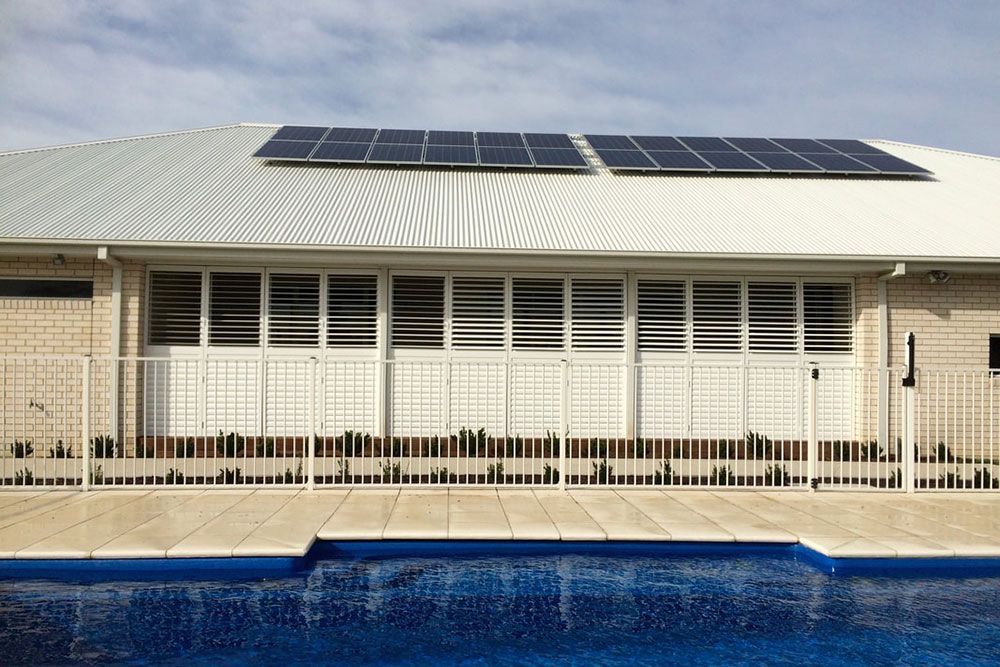Poolside Exterior Shutters Accentuating the Scene - Luxaflex Outdoor Blinds & Awnings In Ballarat