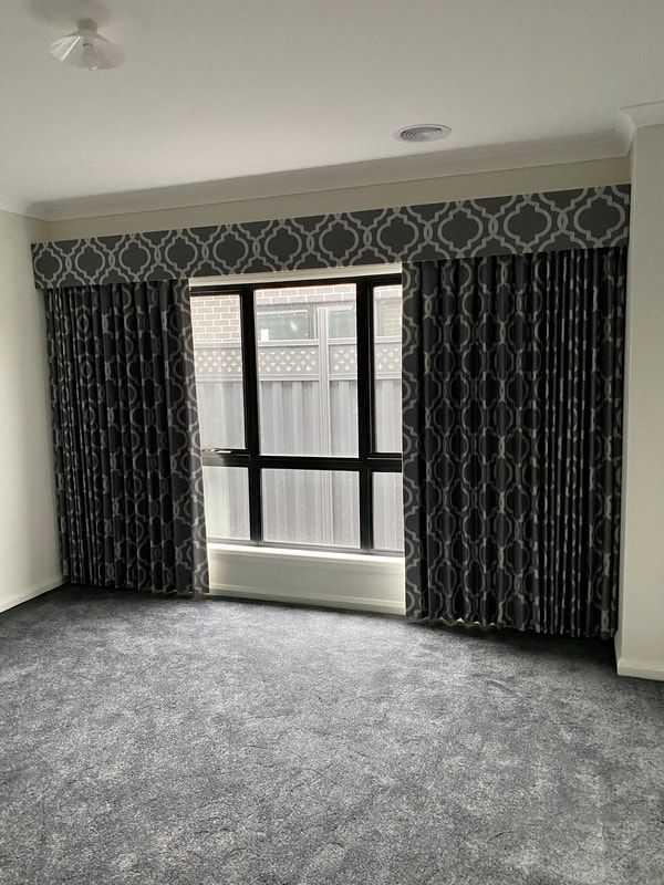 Stylish Black Pelmets Adorning a Generous Window - Luxaflex Curtains In Ballarat