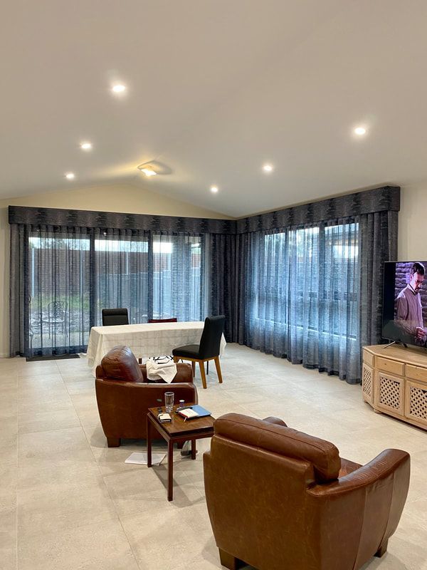 Living Area With Black Curtains - - Luxaflex Window Furnishings In Bacchus Marsh
