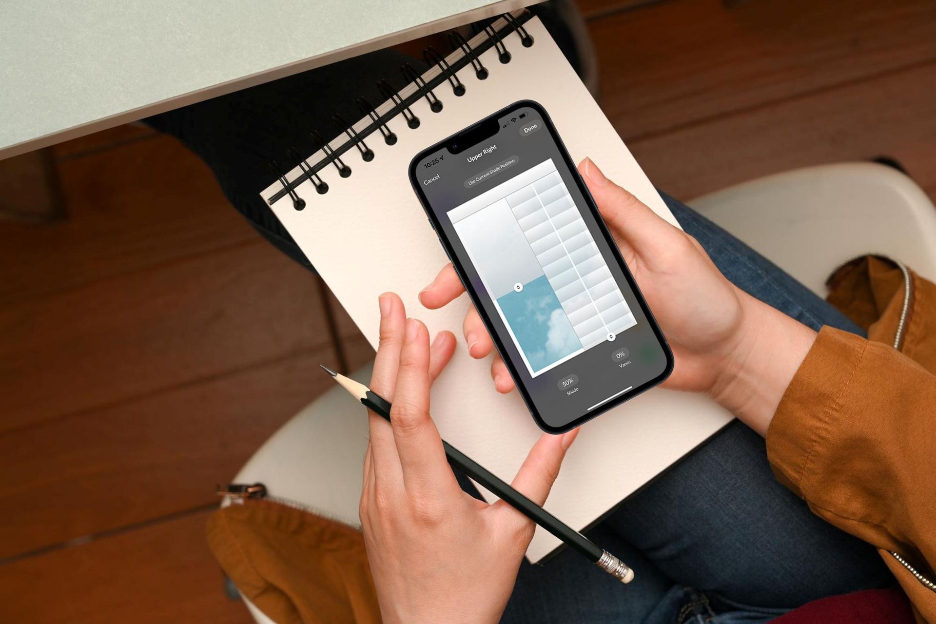 A Person is holding a Cell Phone, Pencil and Notebook — Luxaflex Soft Shades In Ballarat