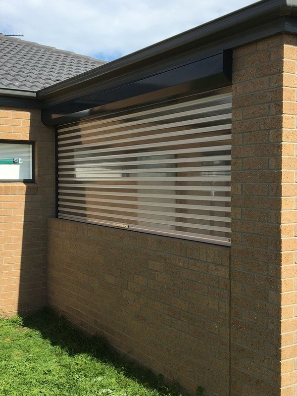 View Luxurious Transparent Roller Shutters at Eureka Blinds & Curtains  - Luxaflex Outdoor Blinds & Awnings In Ballarat