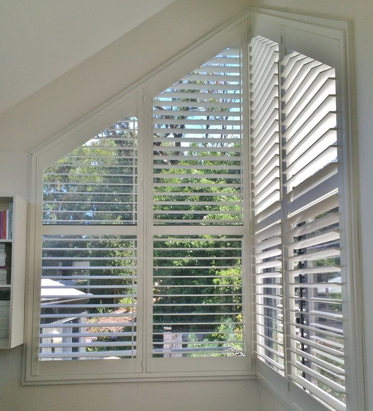 Chic Semi-Opened PolySatin Shutters Accentuating Space - Luxaflex Plantation Shutters In Ballarat