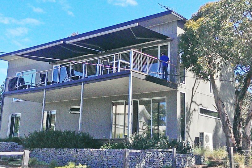 Front View of a House with Luxaflex Blinds and Curtains - Window Furnishings In Ballarat