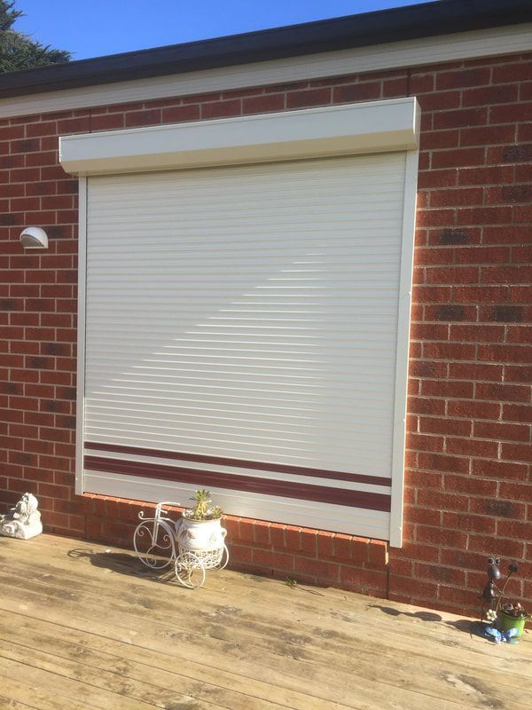 Classic Closed Roller Shutters Enhancing the Space - Luxaflex Outdoor Blinds & Awnings In Ballarat
