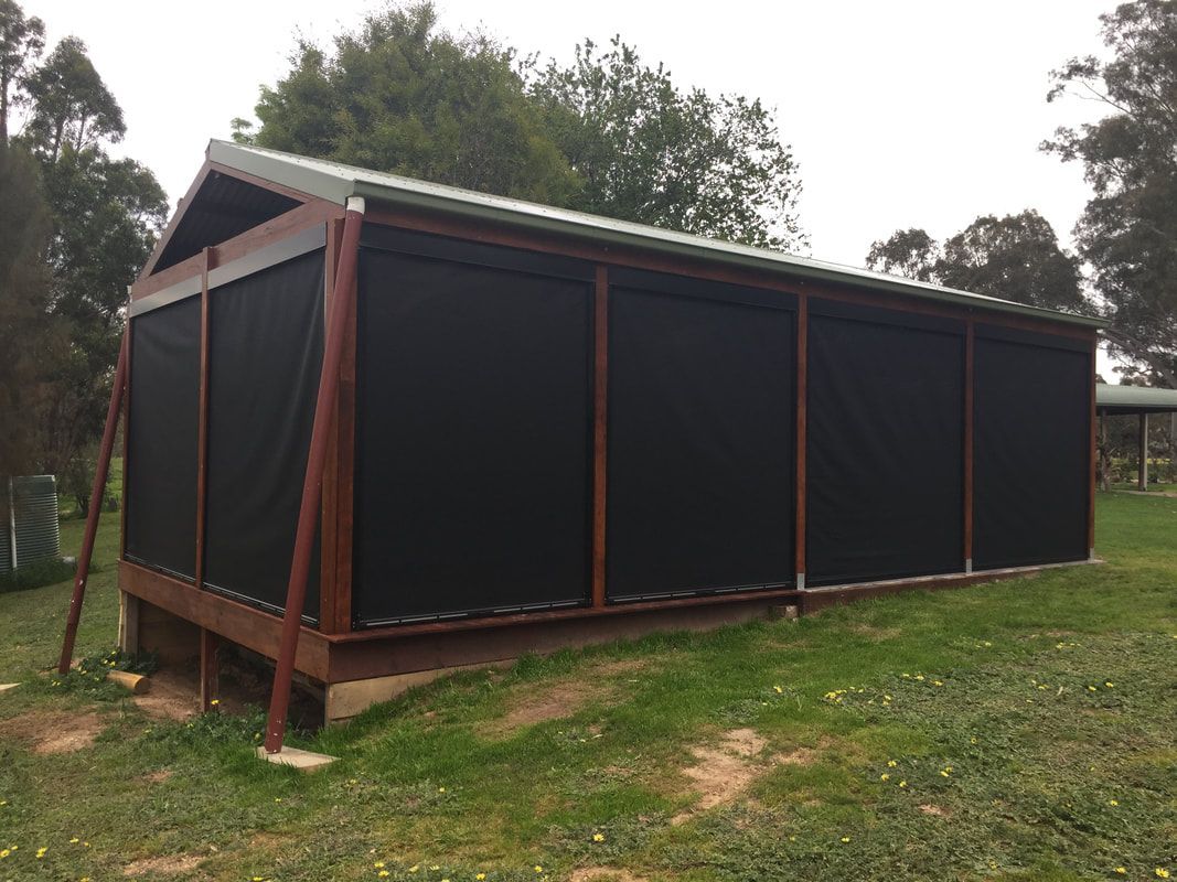 Outdoor structure with ziptrak roller blinds all around - Luxaflex Outdoor Blinds & Awnings In Ballarat