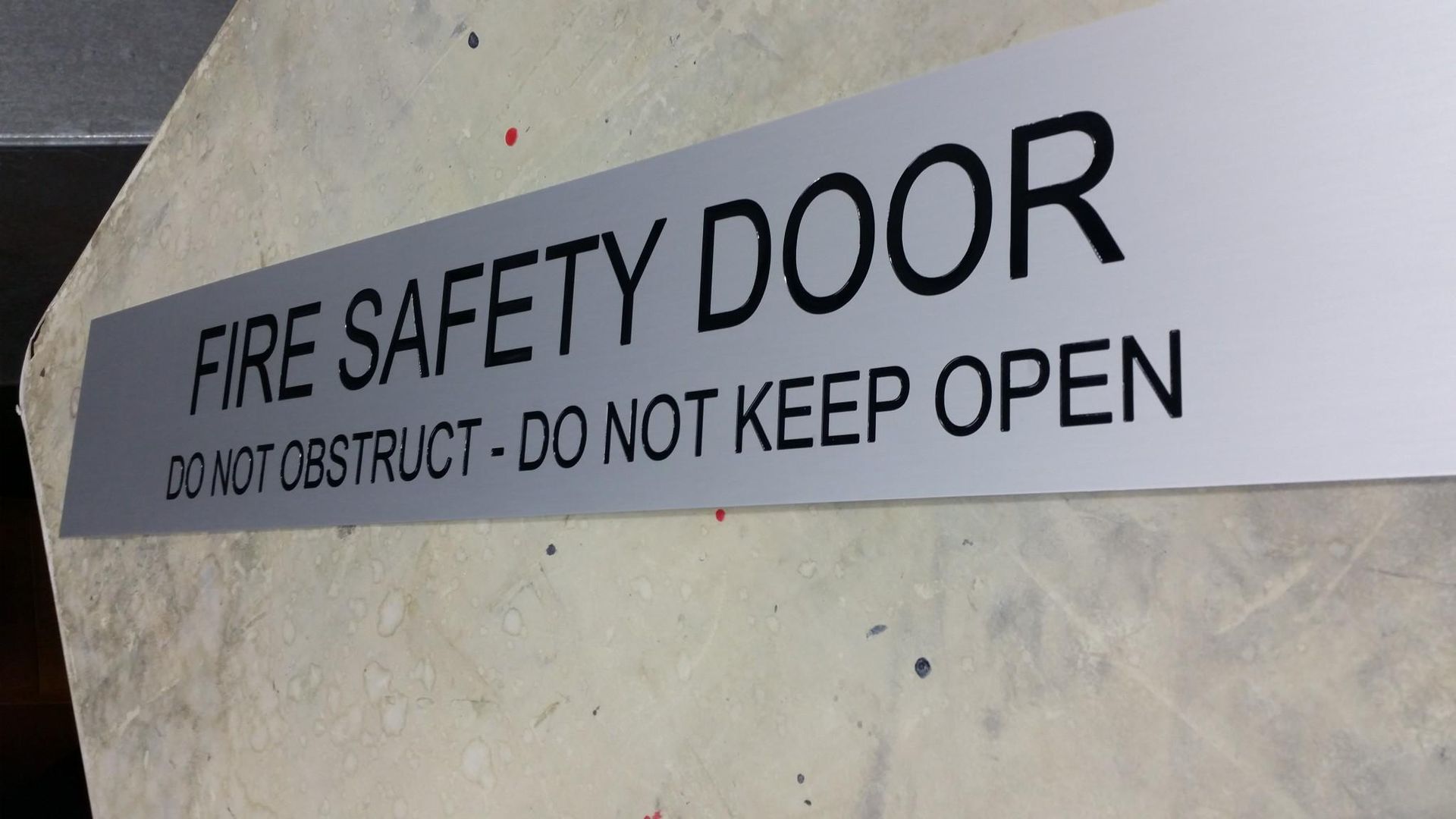 A Sign That Says Fire Safety Door Do Not Obstruct Do Not Keep Open — Total Engraving In Sandgate, NSW