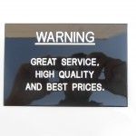 A Warning Sign That Says Great Service, High Quality and Best Prices — Total Engraving In Sandgate, NSW