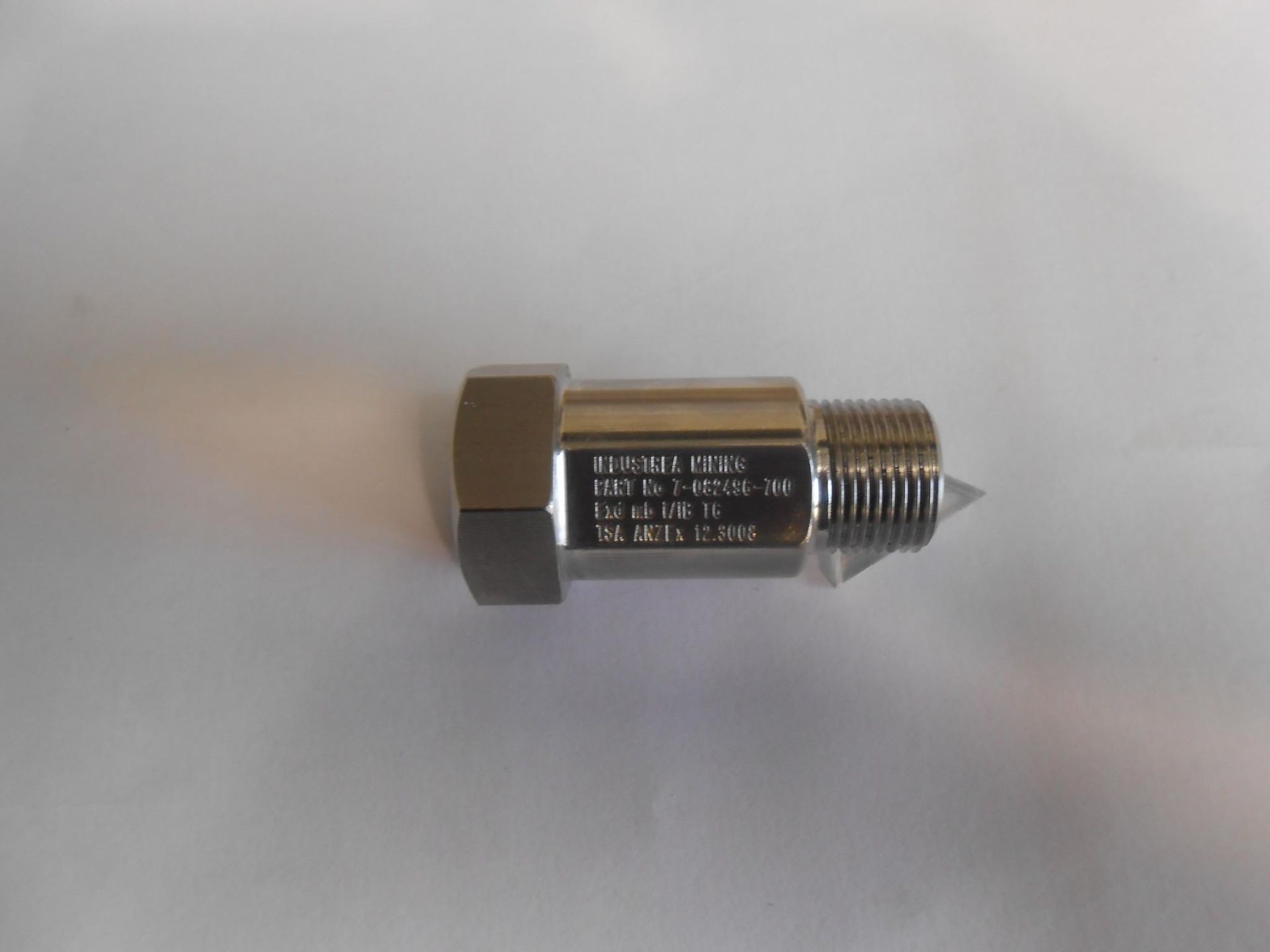 A Metal Object is Sitting on a White Surface — Total Engraving In Sandgate, NSW