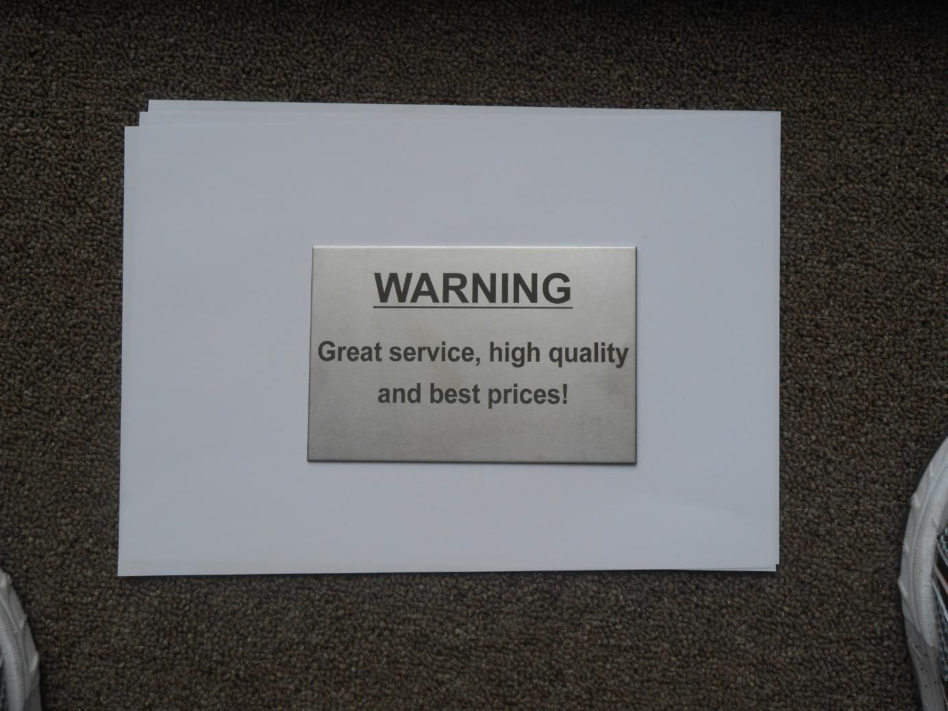 A Sign That Says Warning Great Service High Quality and Best Prices — Total Engraving In Sandgate, NSW