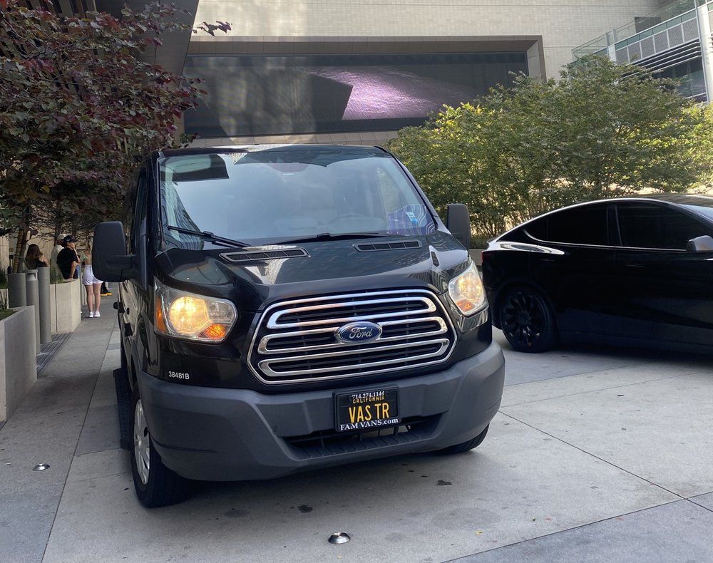 Black Ford Transit van with a 