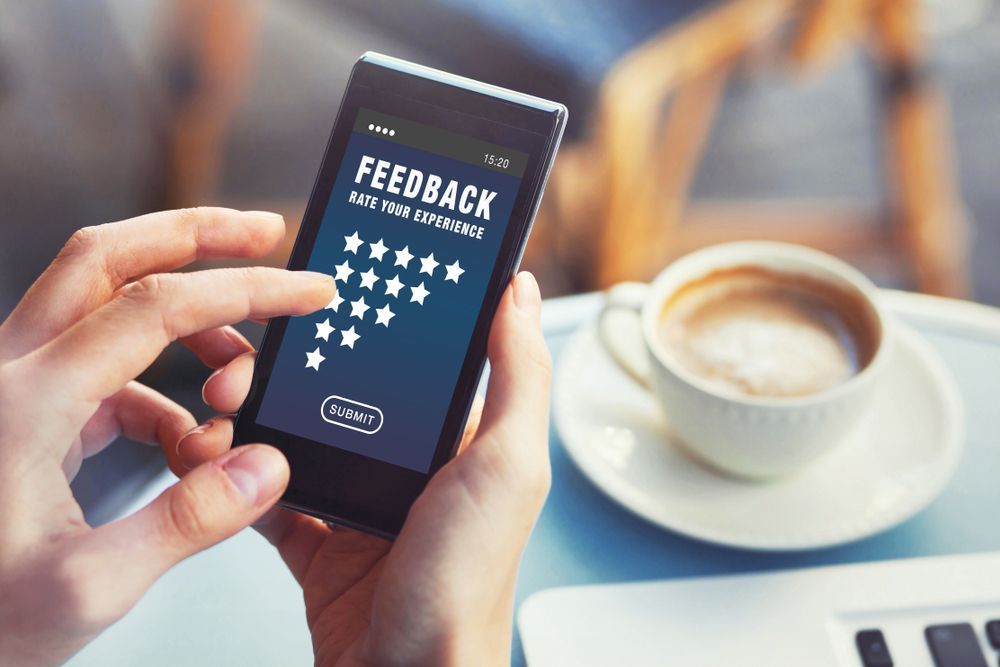 Person Uses a Phone to Give Feedback — DevicePro - Phone & Tablet Specialist In Cannonvale, QLD