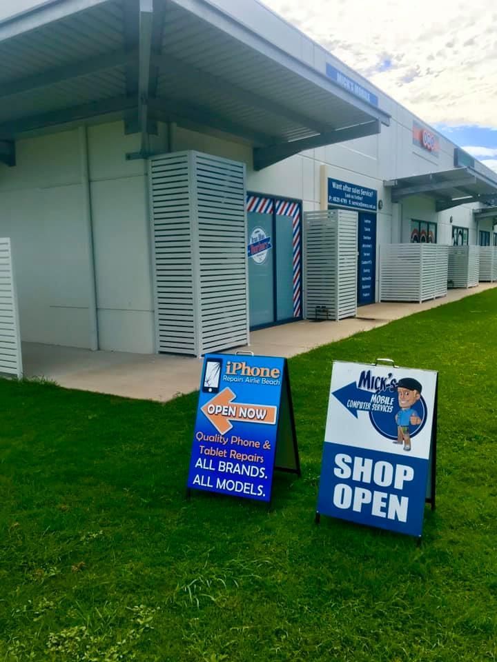 Signs in Front of A Building — DevicePro - Phone & Tablet Specialist In Cannonvale, QLD