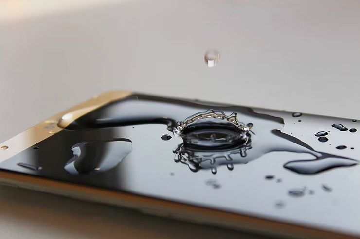 Water Droplet Hitting a Tablet, Creating a Splash — DevicePro - Phone & Tablet Specialist In Cannonvale, QLD