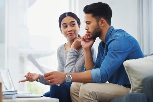 couple thinking about mortgage