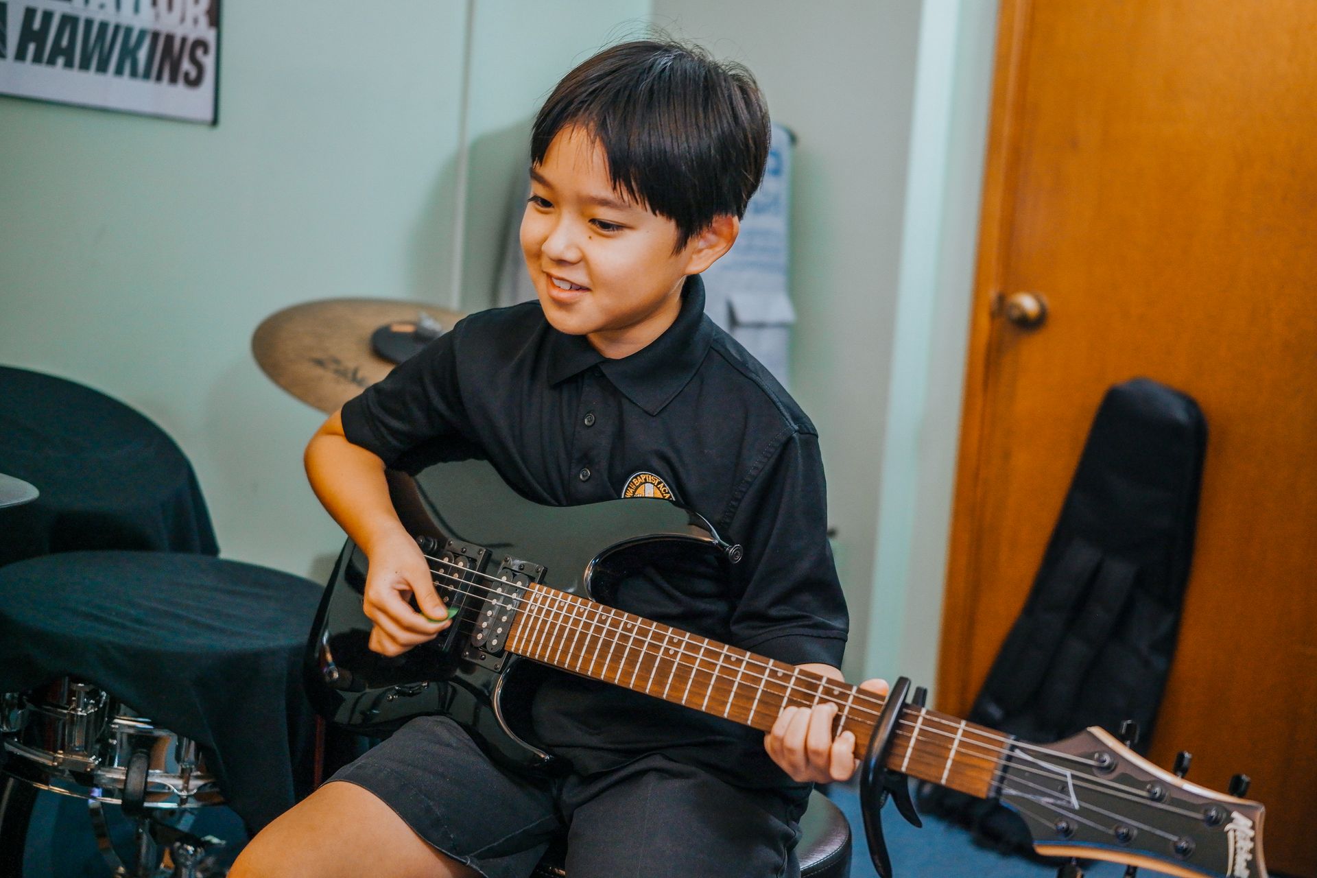 Young Boy Playing Guitar — Pearl City, HI — Hawaii Musicworks — Aiea — Kapolei — Ewa Beach — Honolulu — Wahiawa — Waipahu — Mililani