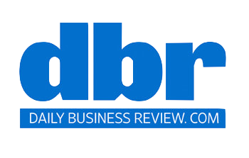 Blue "dbr" logo with "DAILY BUSINESS REVIEW.COM" below.