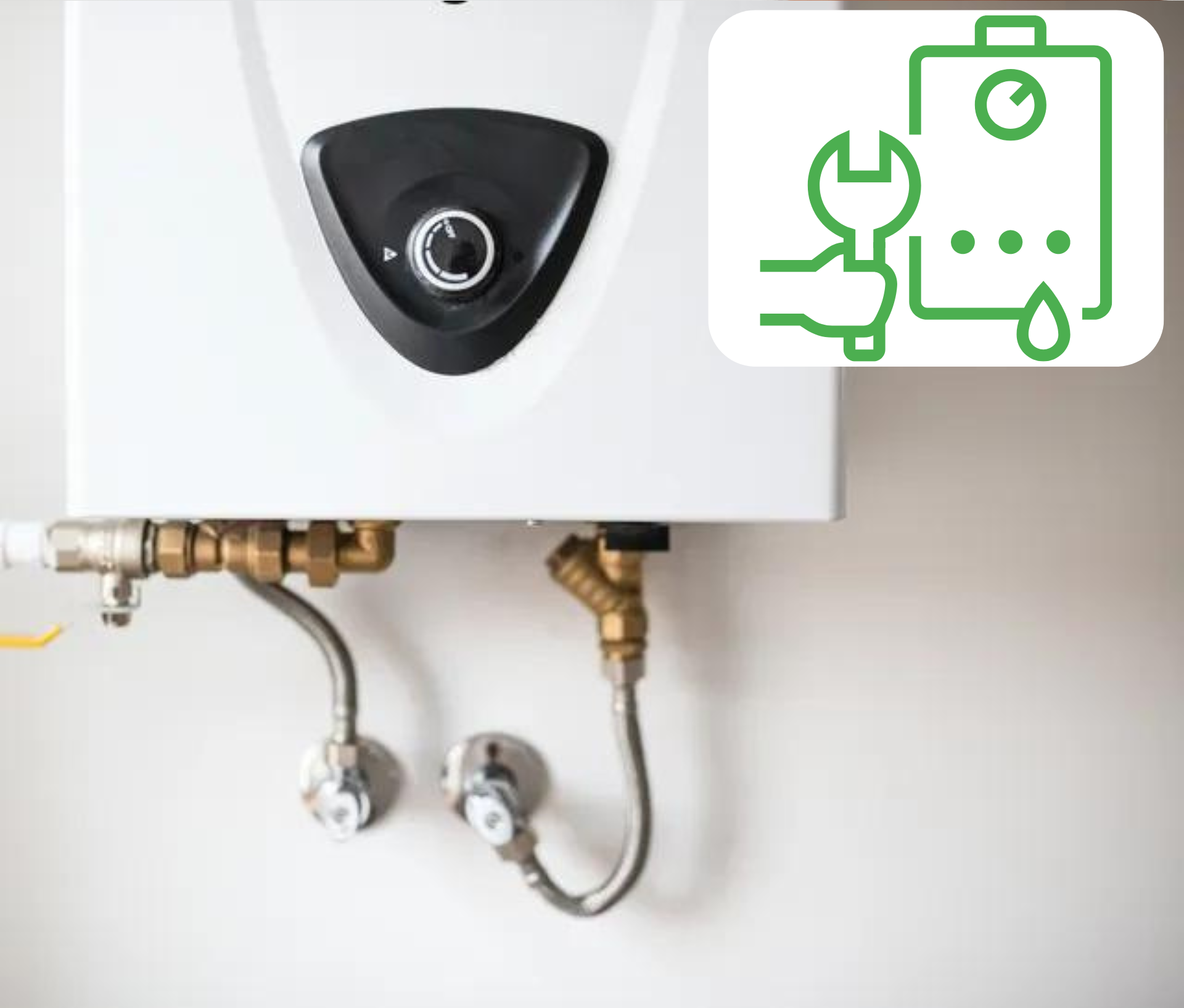 Un chauffe-eau est accroché au mur à côté d'une clé à molette.