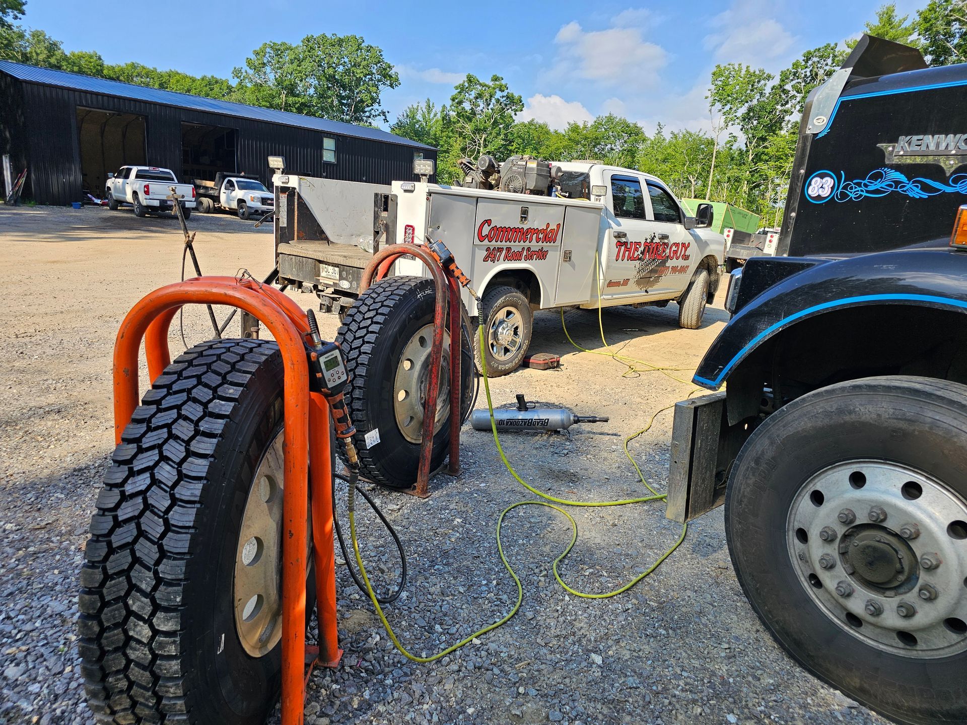 Two trucks are parked next to each other in a parking lot.
