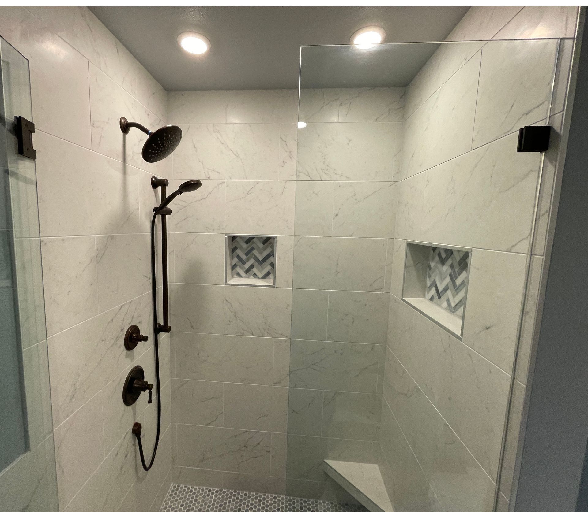 Tulsa Bathroom remodel spa shower stained glass mosaic tile inset marble floor gothic black granite counter