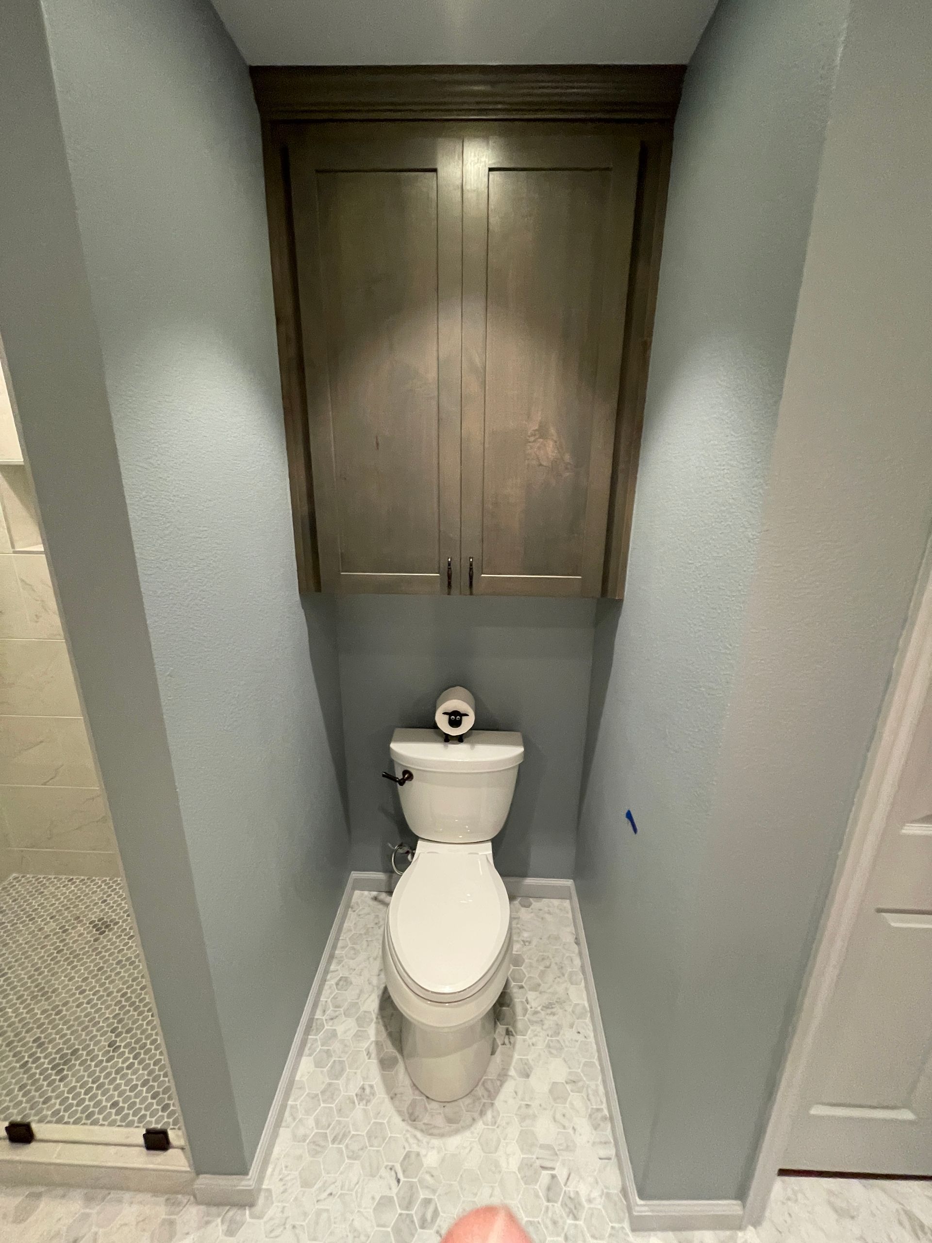 Tulsa Bathroom remodel spa shower stained glass mosaic tile inset marble floor gothic black granite counter