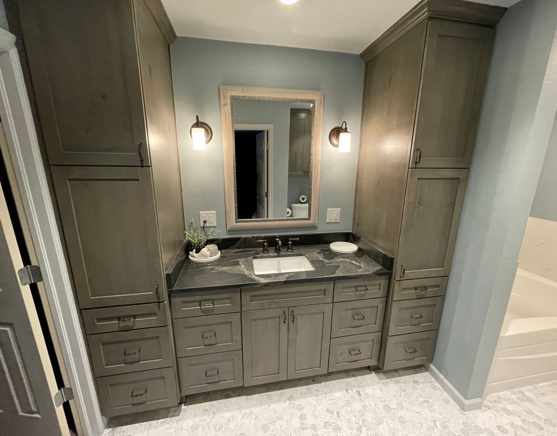 Tulsa Bathroom remodel spa shower stained glass mosaic tile inset marble floor gothic black granite counter