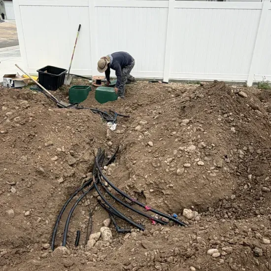 Landscape water drainage installation in Ogden UT helping manage runoff and maintain healthy outdoor spaces