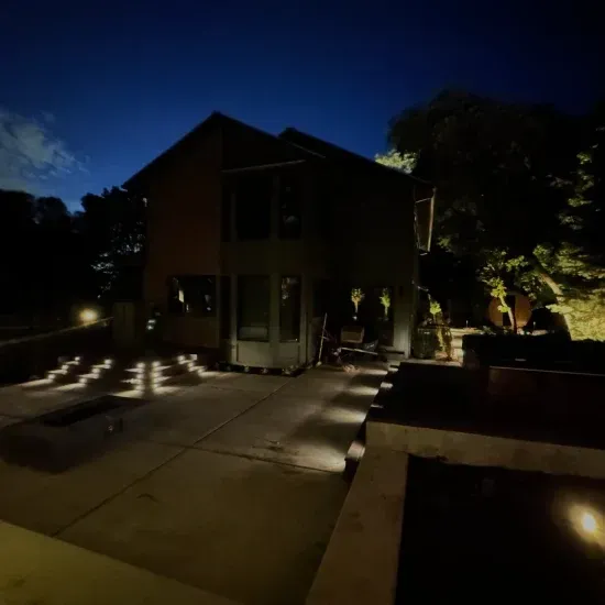 Custom outdoor lighting design in Ogden UT enhancing landscapes with decorative and functional illumination
