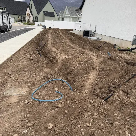 Backyard drainage improvement service in Ogden UT reducing pooling water and protecting property foundations