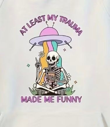 Skeleton meditating under pink hat with text: “At least my trauma made me funny.”T-Shirt