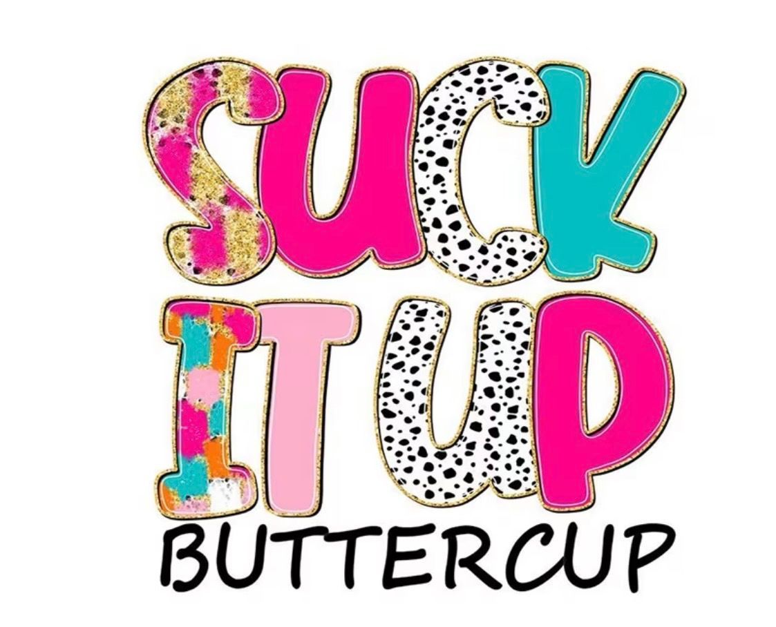 Colorful “Suck It Up Buttercup” t-shirt in patterned pink, teal, and black lettering