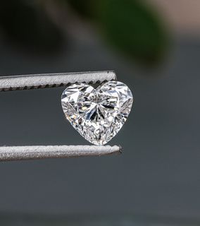 A blue and white diamond on a white background