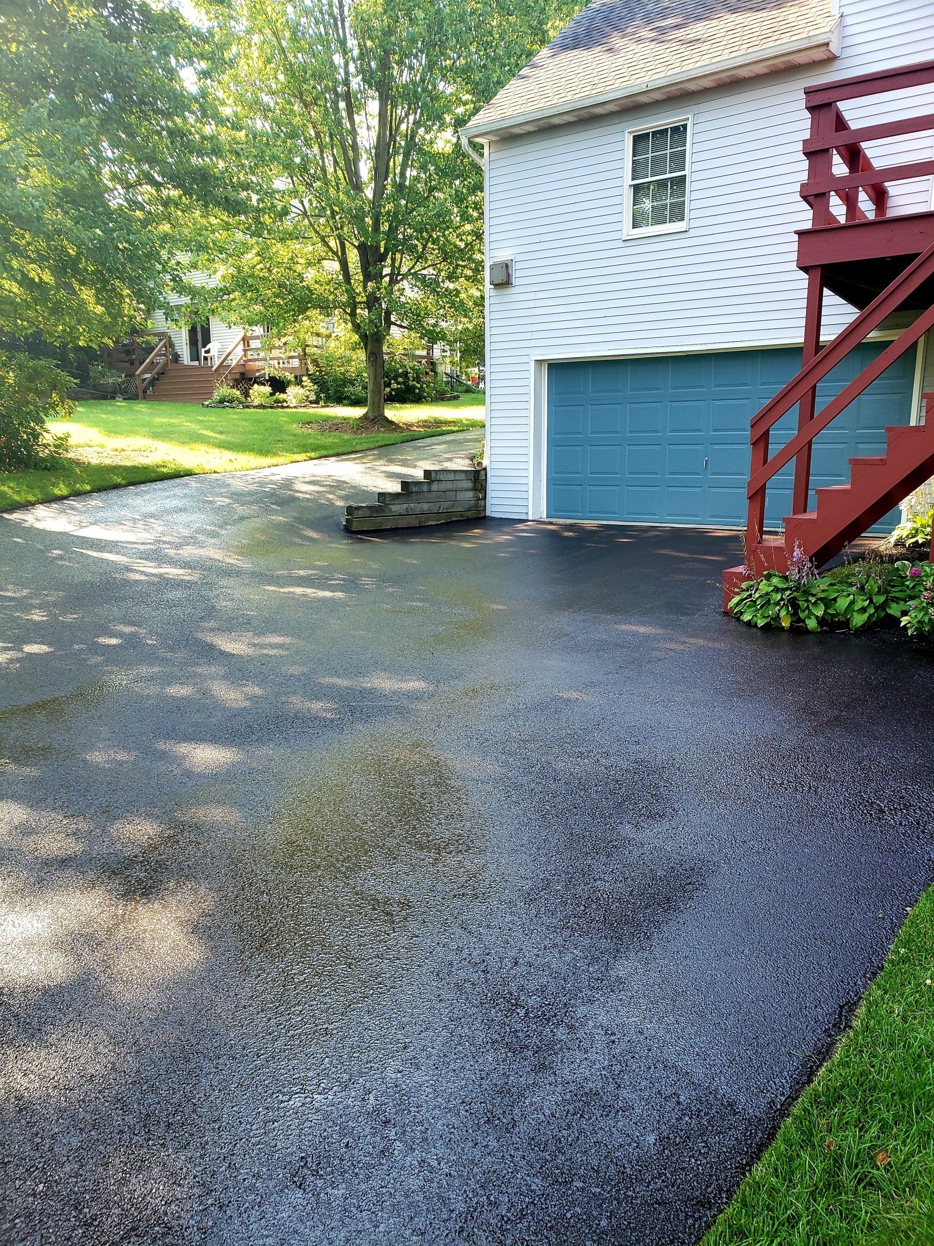 Sealcoating In Front Of The Driveway — Windsor, PA — Yorktowne Lawns Inc.