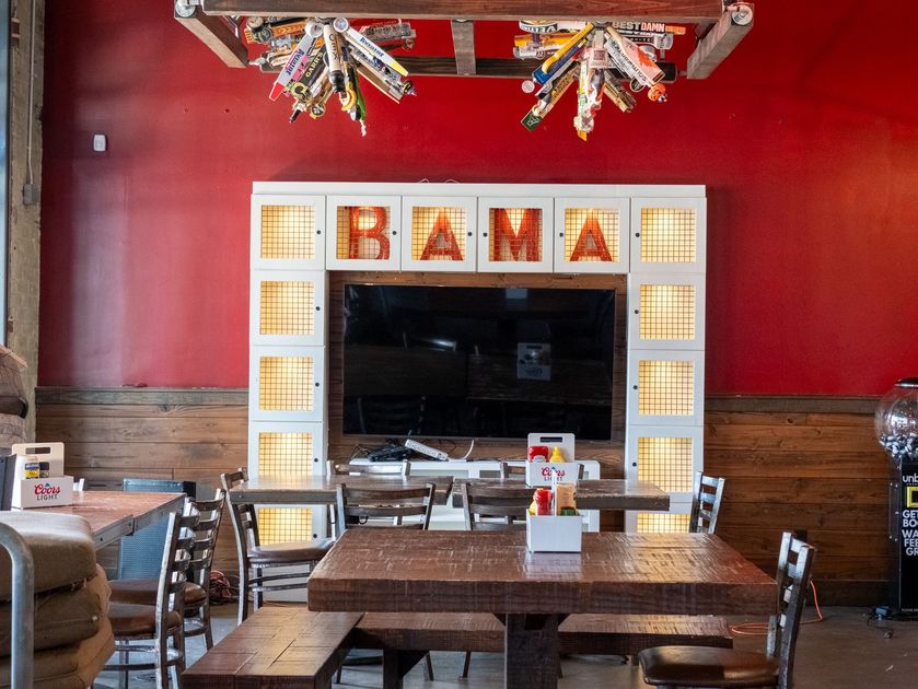 A bottle of fireball whiskey sits on a bar