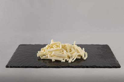 Mozzarella per pizza tagliata a cubetti