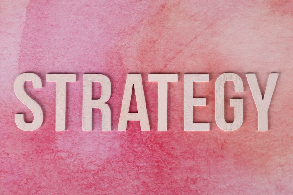 Small business owner planning a marketing strategy before running tactics