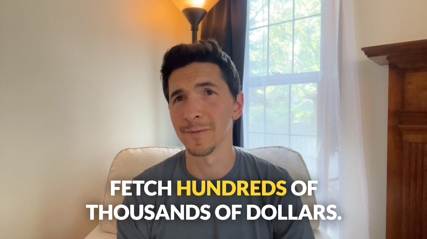 Man in gray shirt speaking, text overlay: 