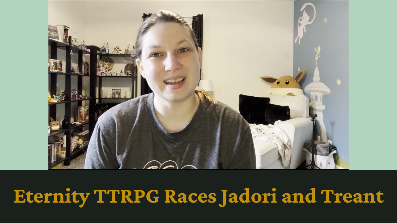 Eternity TTRPG Races Person smiling on camera in a home office, with shelves and a yellow plush cat behind them.